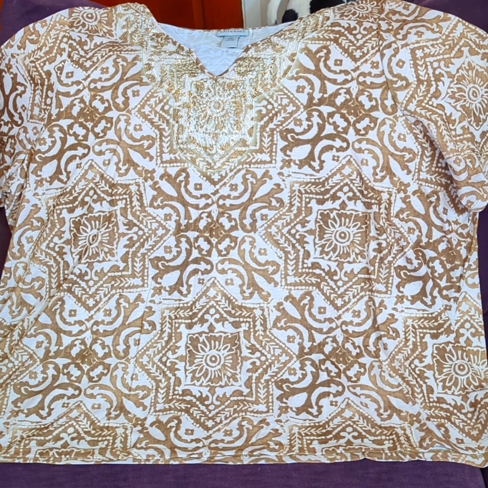 A beaded tie die patterned top